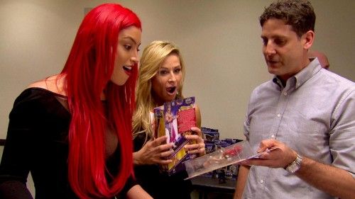 WWE Diva Eva Marie sees her first ever Mattel WWE figure as Natalya looks on!